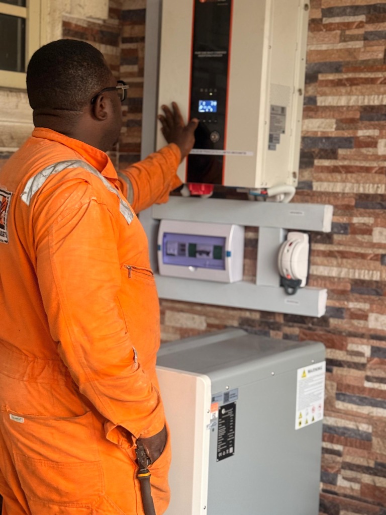 Founder Adjusting Solar Inverter